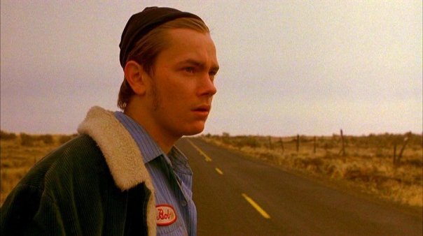 River Phoenix, waiting for a ride.