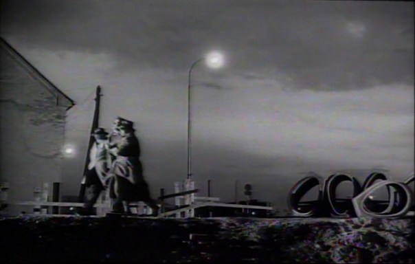 K.'s executioners walk him to the quarry.